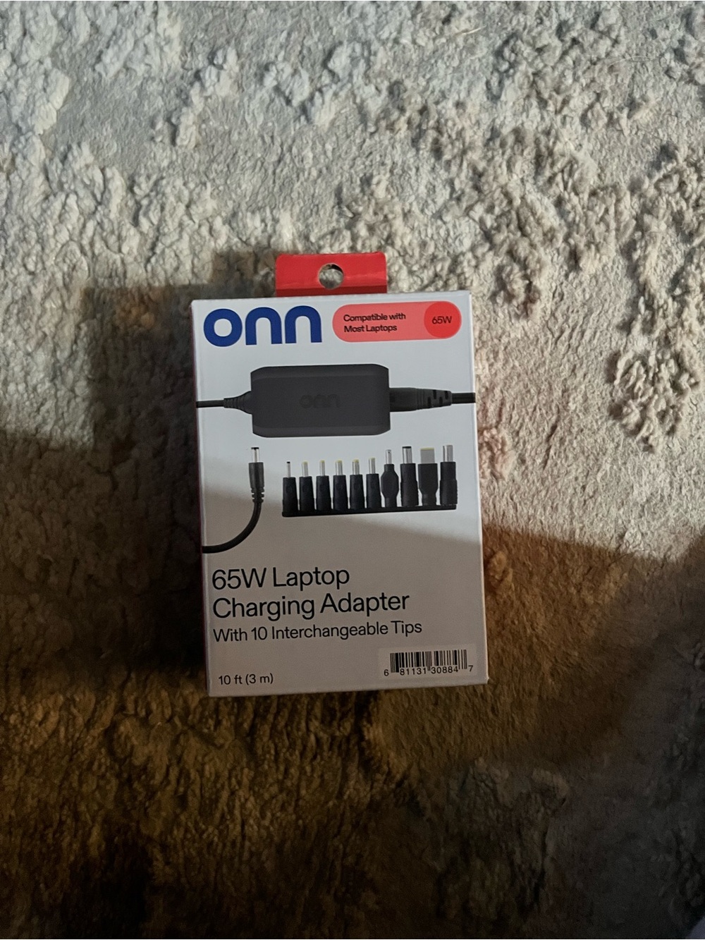 Onn 65W Laptop Charging Adapter in White and Black with 9 Tips